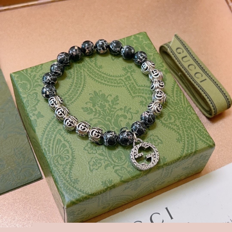 G*u*i bracelets